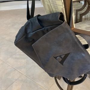 Thirty-one Initial A black backpack